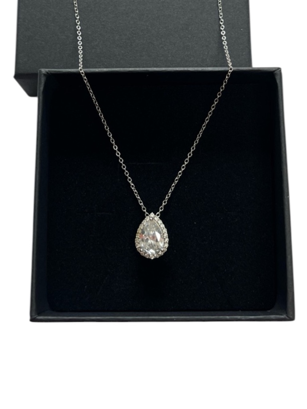 Sterling silver necklace, CZ pear shaped teardrop pendant. Sparkly.
Stamped 925
